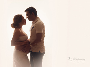 Maternity photography Vancouver couple poses in studio lovely pregnancy photos