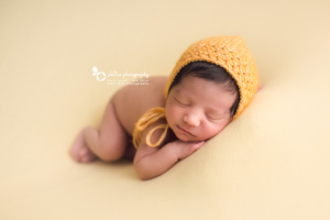 newborn photography - north vancouver - yellow back ground - baby girl