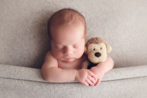 vancouver burnaby newborn photography - luca - with monkey