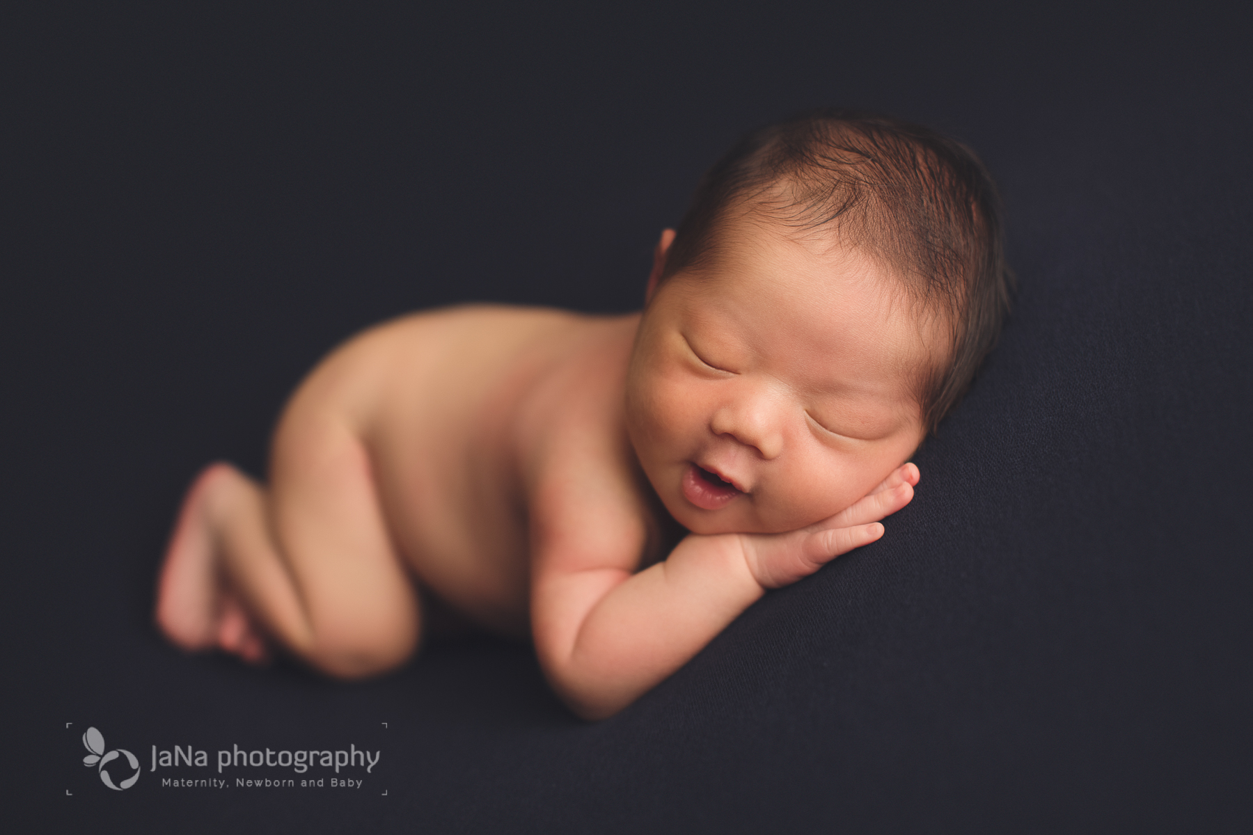 newborn photography - side position - smile