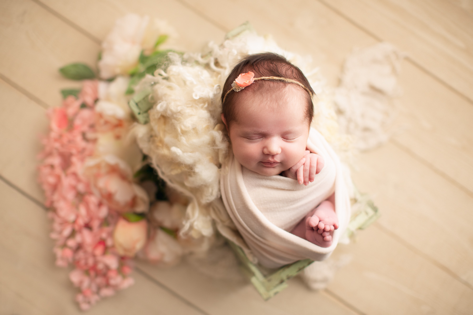 vancouver newborn photography - Stephanie - green bed and flower