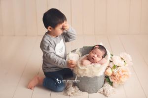 newborn sibling photography