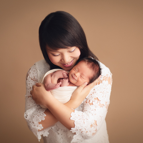 Mother And Newborn Baby Photography