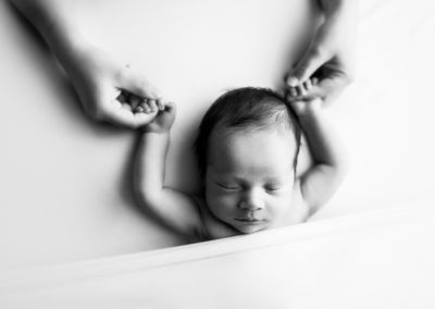 baby boy newborn photography with dad hand | vancouver