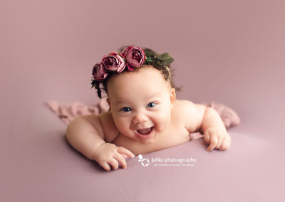 baby girl smile - pink back ground