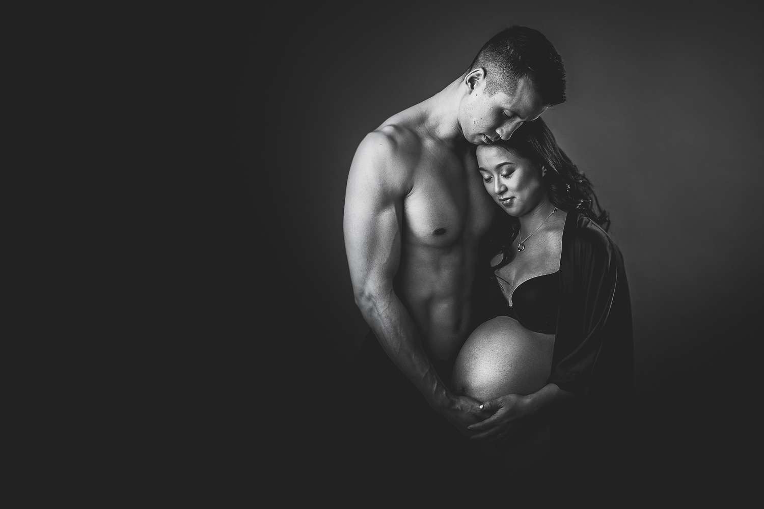 black and white maternity photography couple