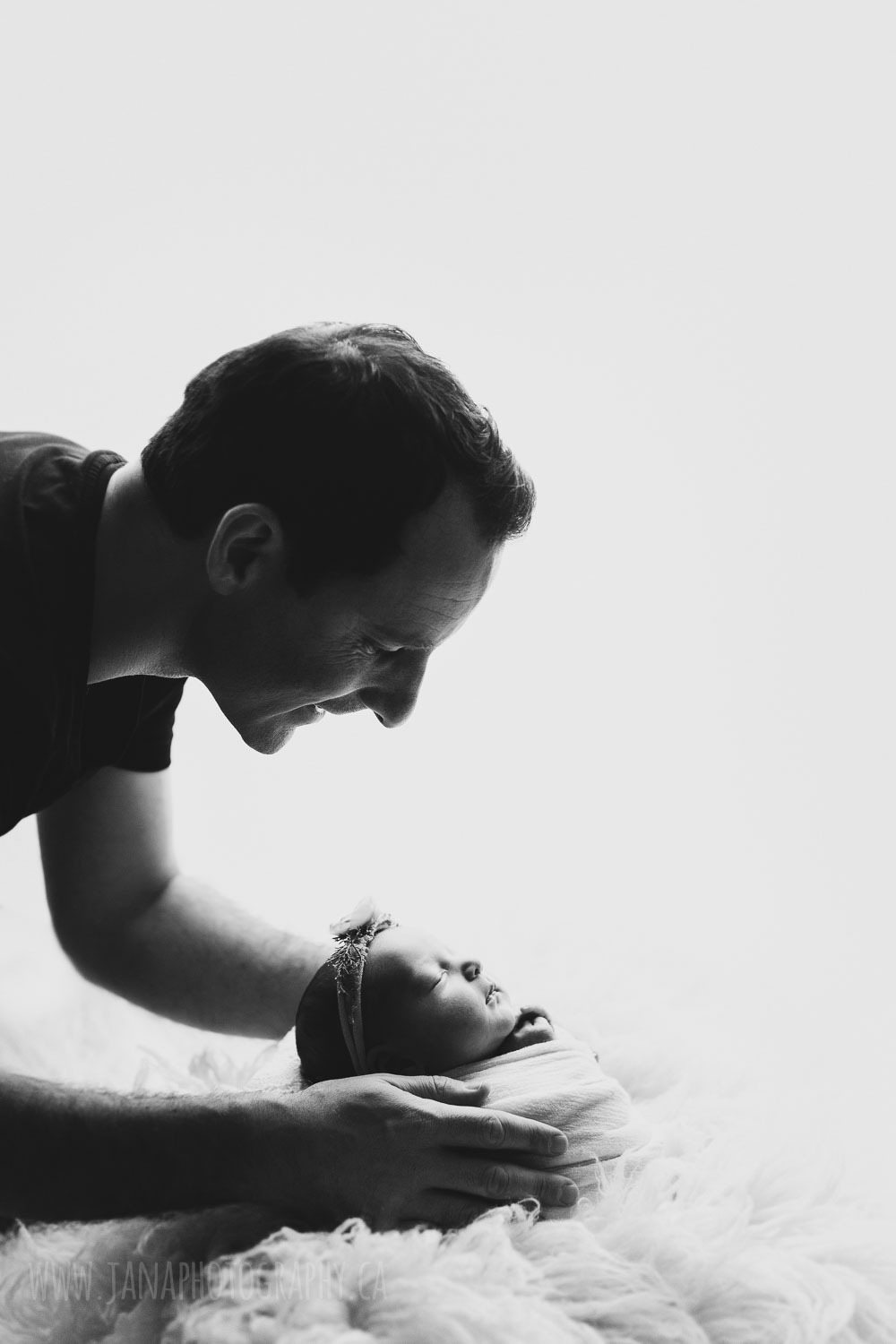 newborn photography baby girl with dad - black and white