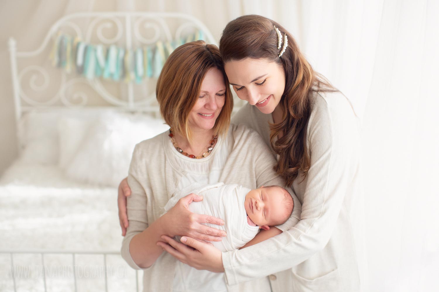 mom and grandmother are holding baby boy - family photography - vancouver - natural light