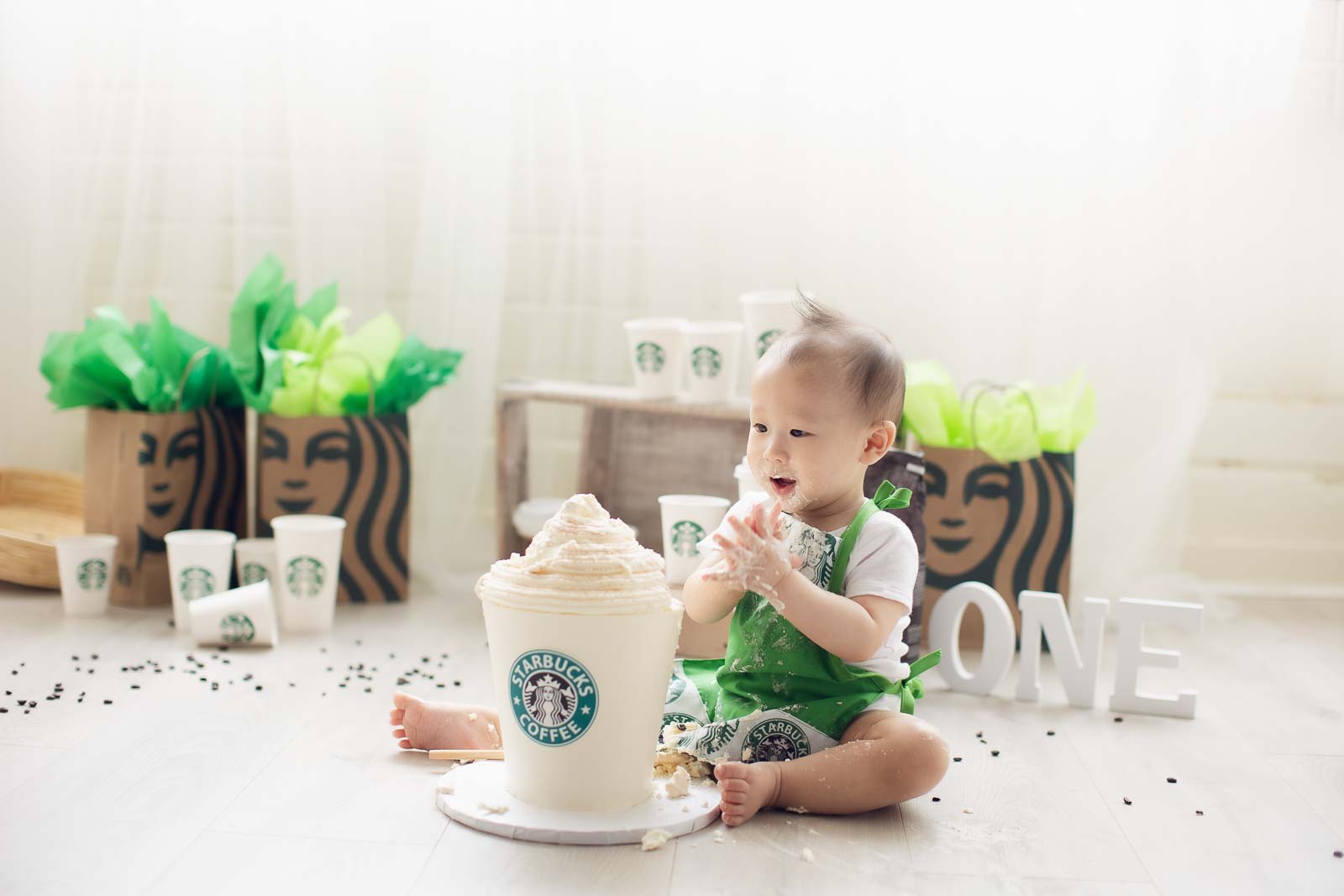 Starbucks cake smash with latte cake in white background