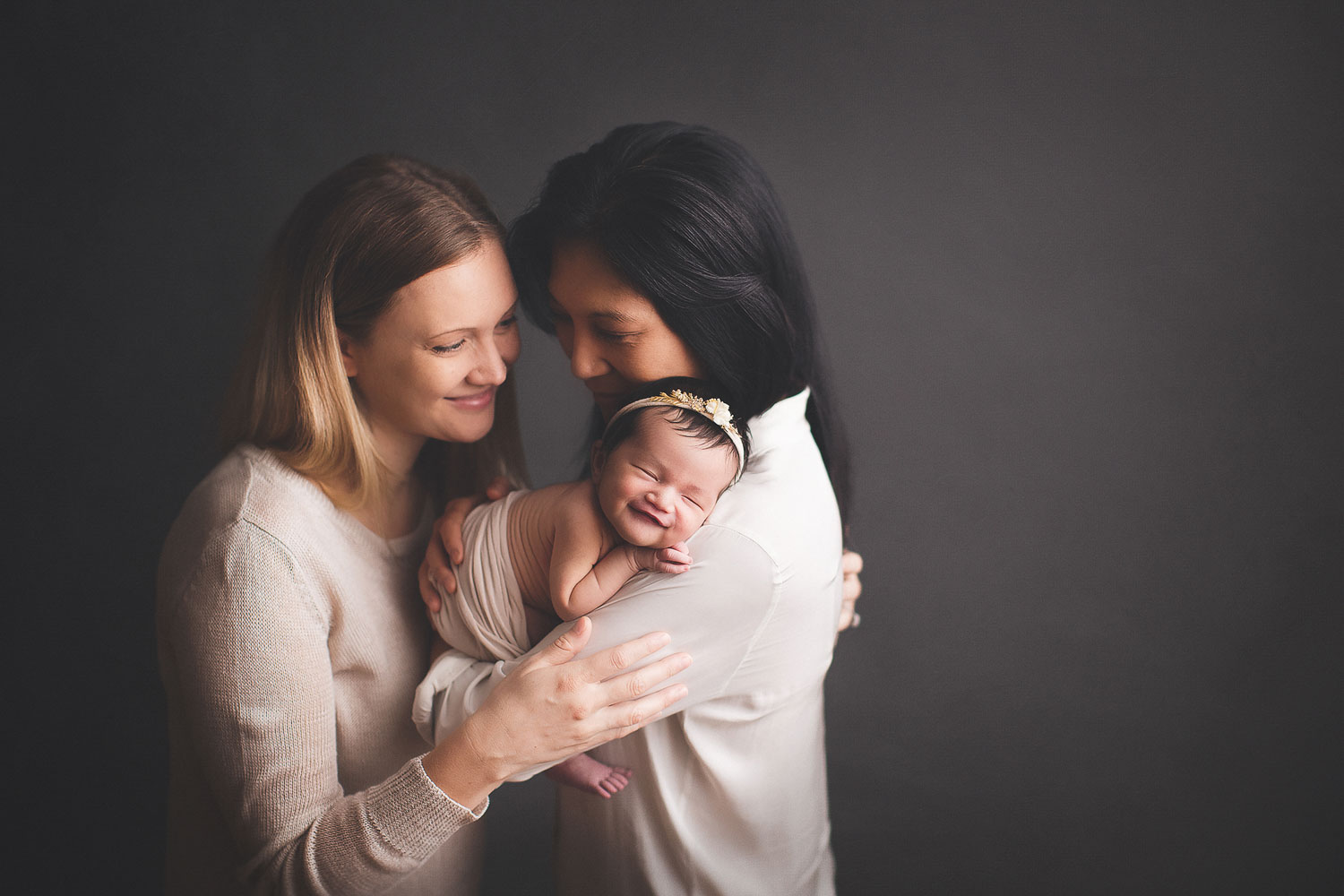 newborn baby girl smile - with mom 