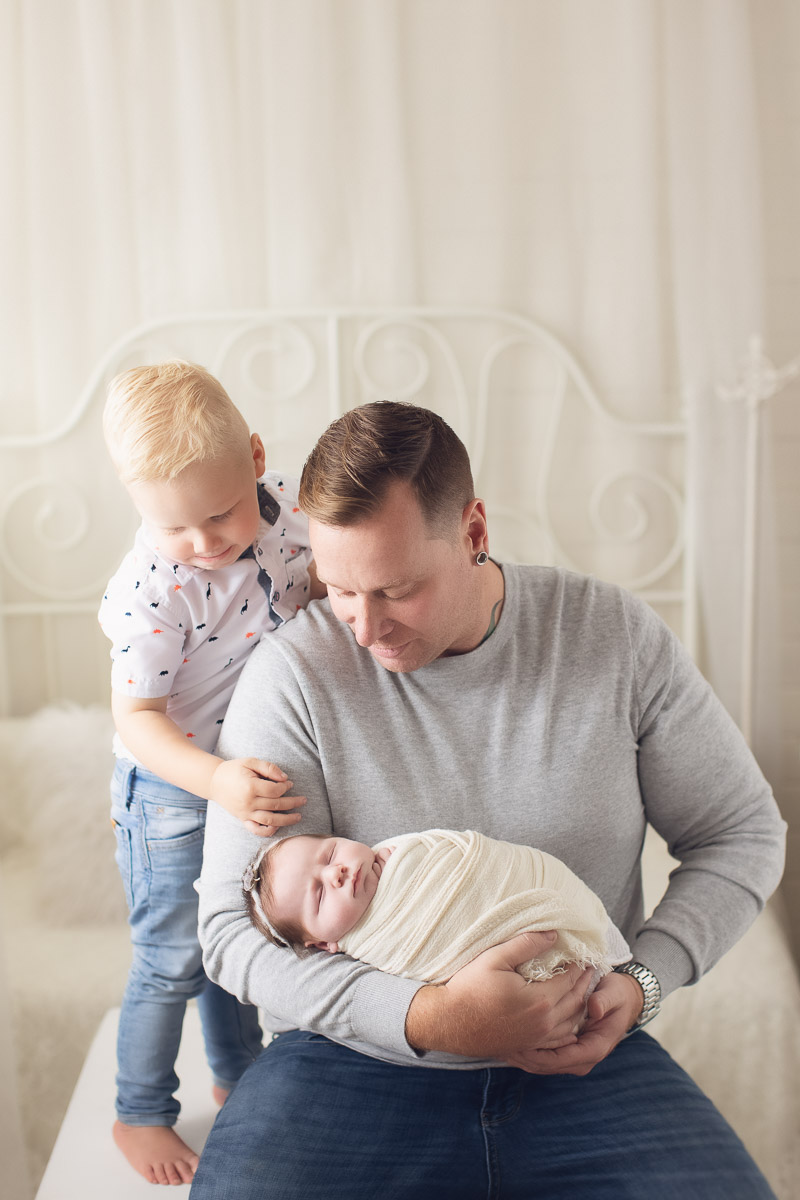 newborn baby girl - open eyes smiles