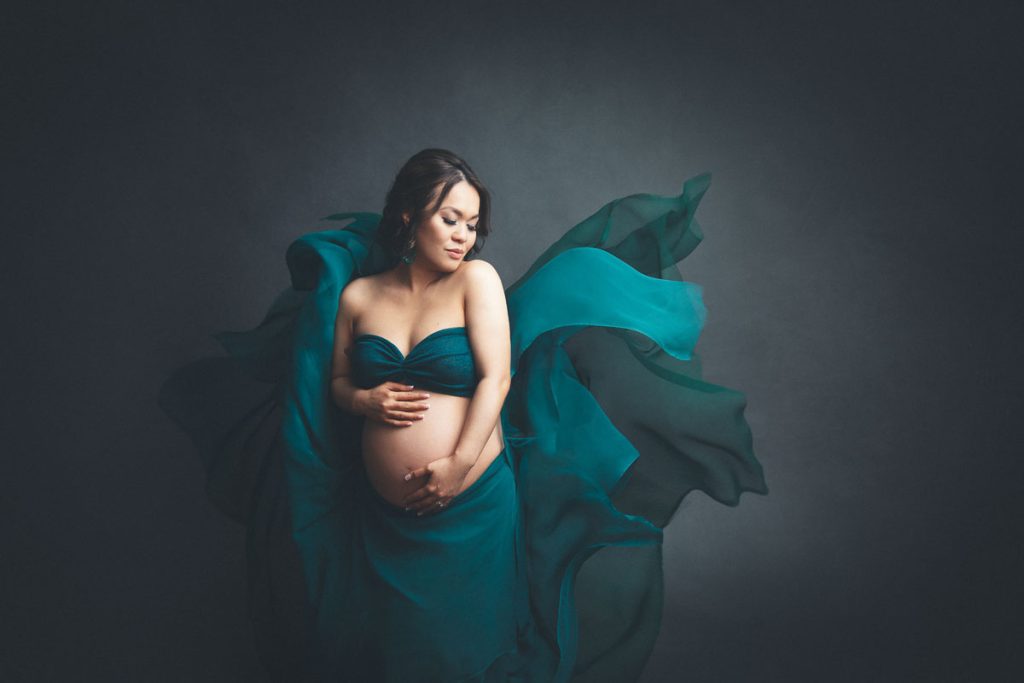 maternity photography green fabric