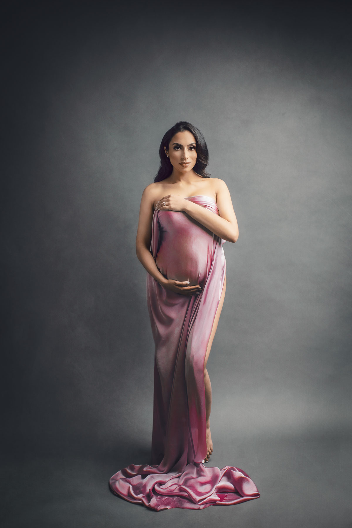 fashion inspired and classic maternity photo with silk drape in pink and purple