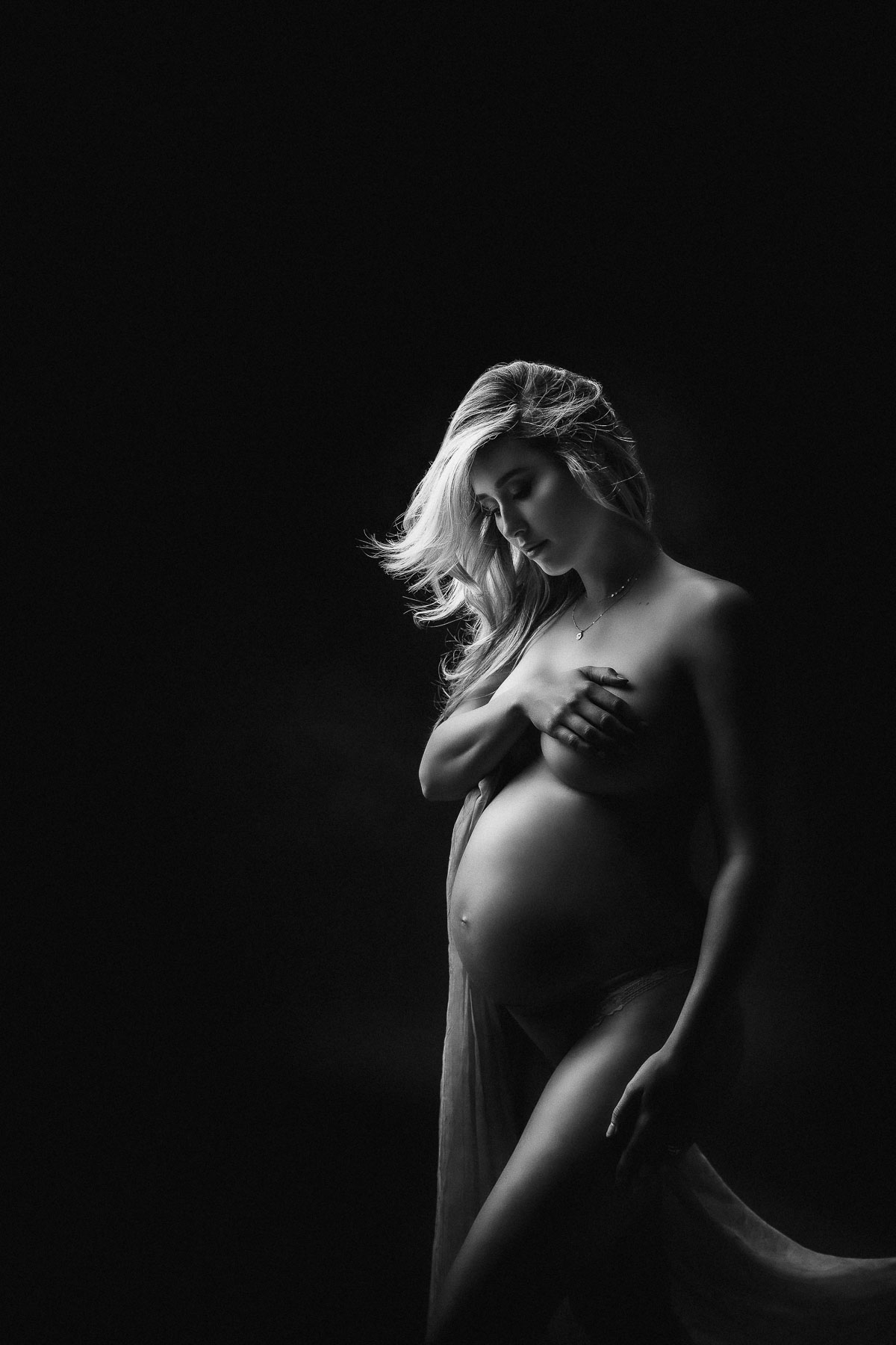 low key studio lighting best pregnancy photo