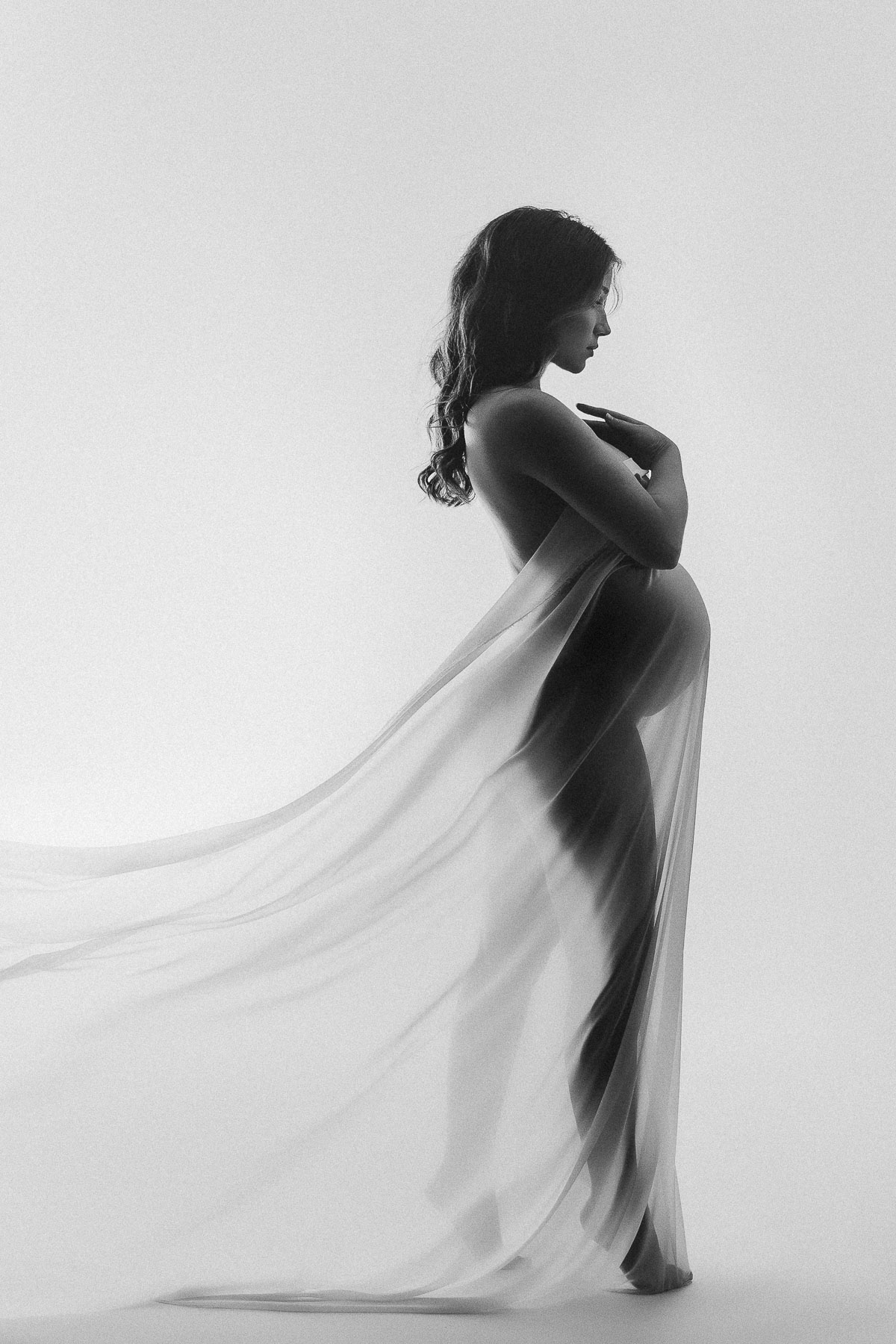 fashion pregnancy photoshoot with bodysuit
