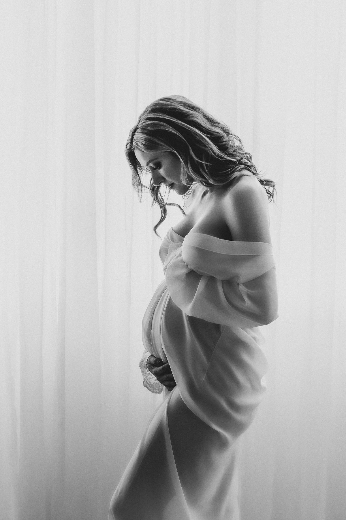 black and white sheer robe in artistic maternity photoshoot