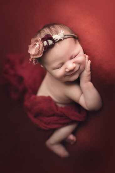 newborn photography vancouver - baby girl in red setup