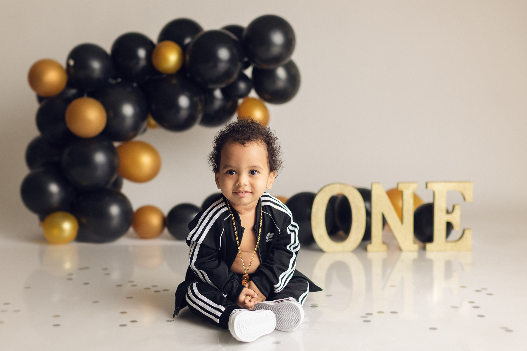 Cake smash photography Theme and preparation - black and gold - baby boy - best cake smash photographer in Vancouver