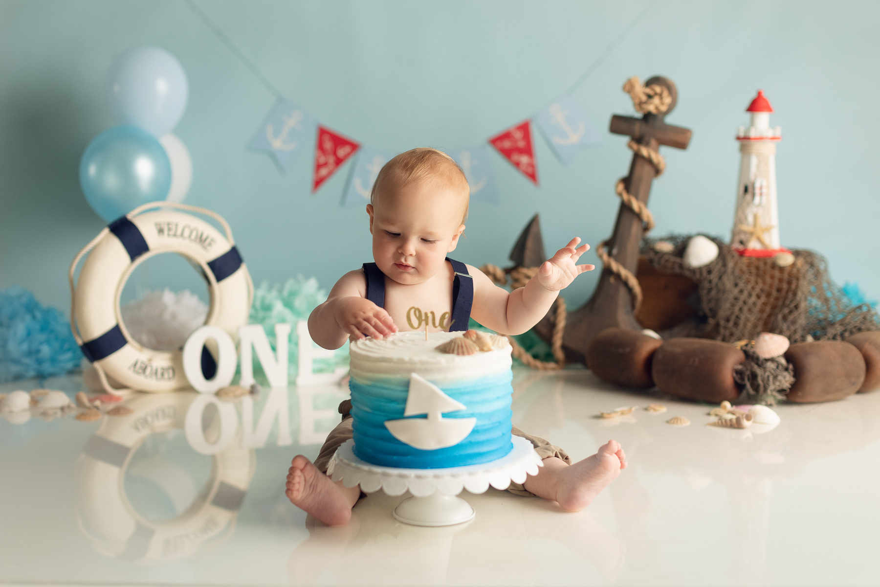 Cake smash photography Theme and preparation - Baby boy - nautical theme - blue and white - best photographer Vancouver