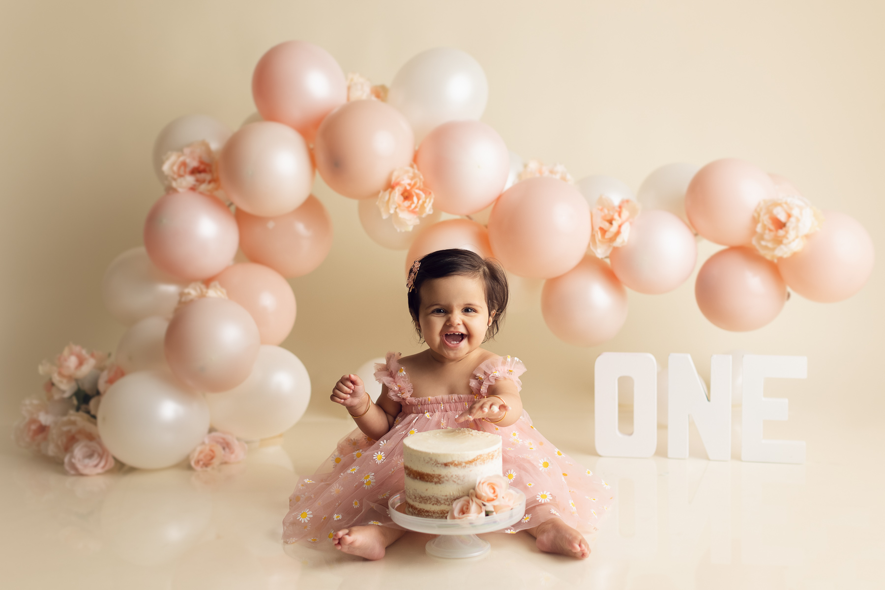 Cake smash photographer - Baby girl - white and pink- baby photography - best photographer Surrey