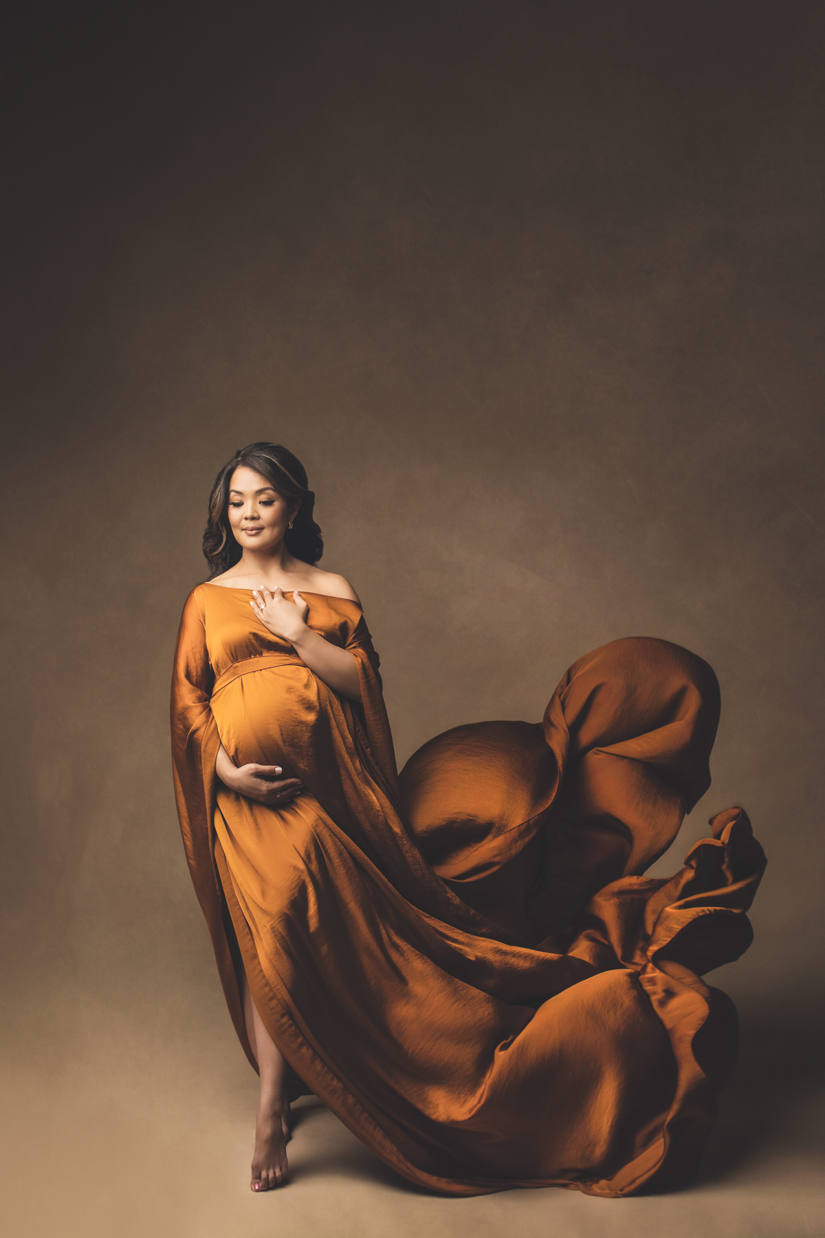 silky gown for professional pregnancy photoshoot dreamy maternity photo in vancouver