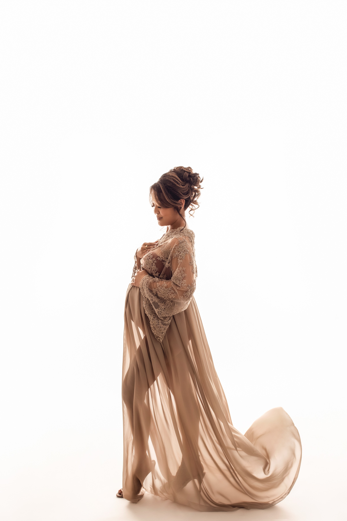 glamorous ivory color gown for maternity photoshoot - pregnant mom looking stunning in the maternity photography session in jana photography Vancouver