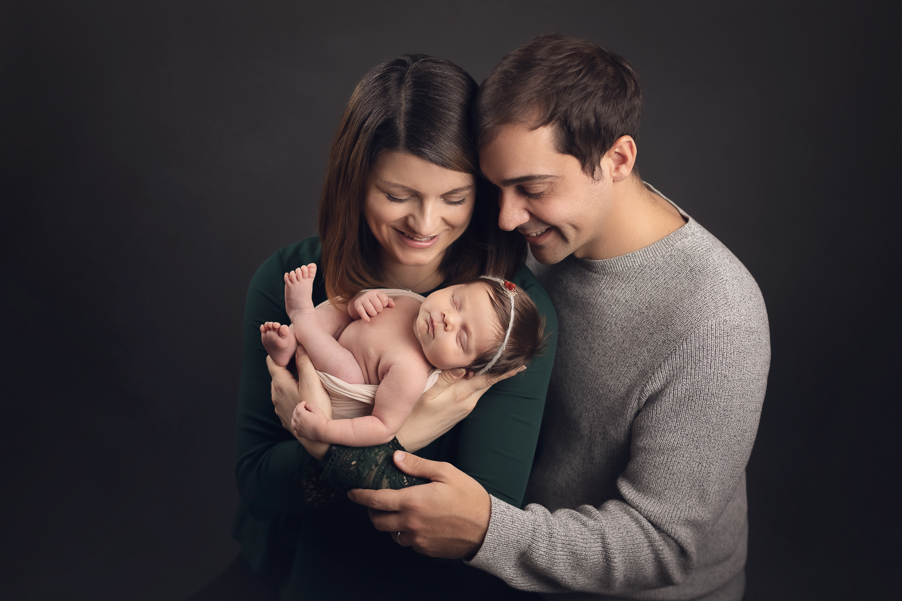 Capturing the Precious Moments of Your Little Angel - family picture - baby girl black background