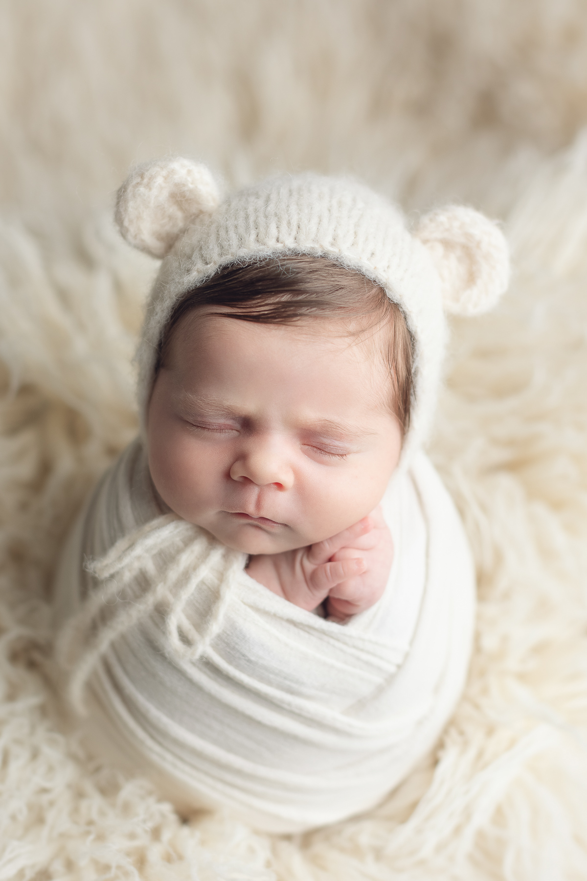 Capturing the Precious Moments of Your Little Angel - baby girl bear white fur