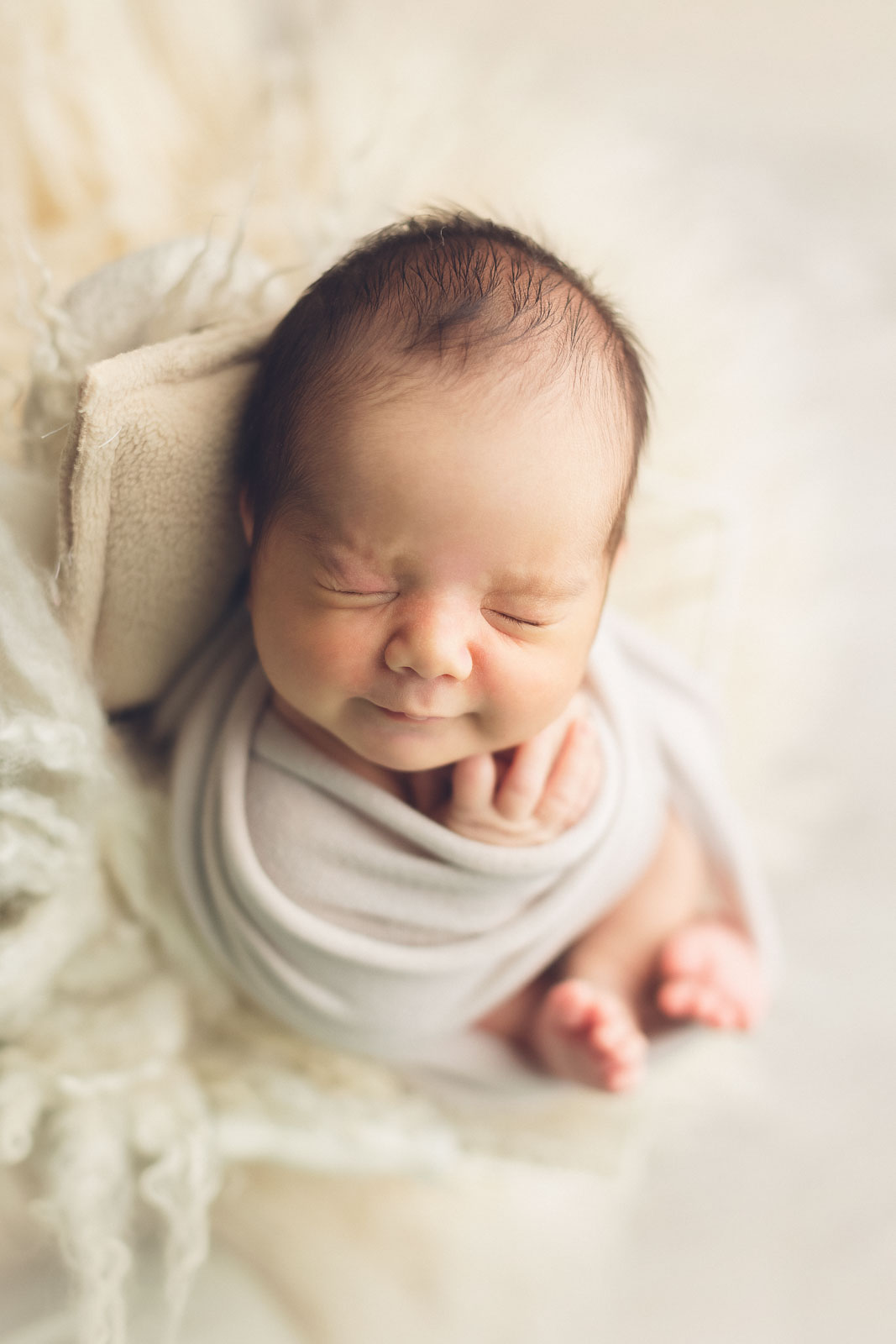 newborn baby with cute expression