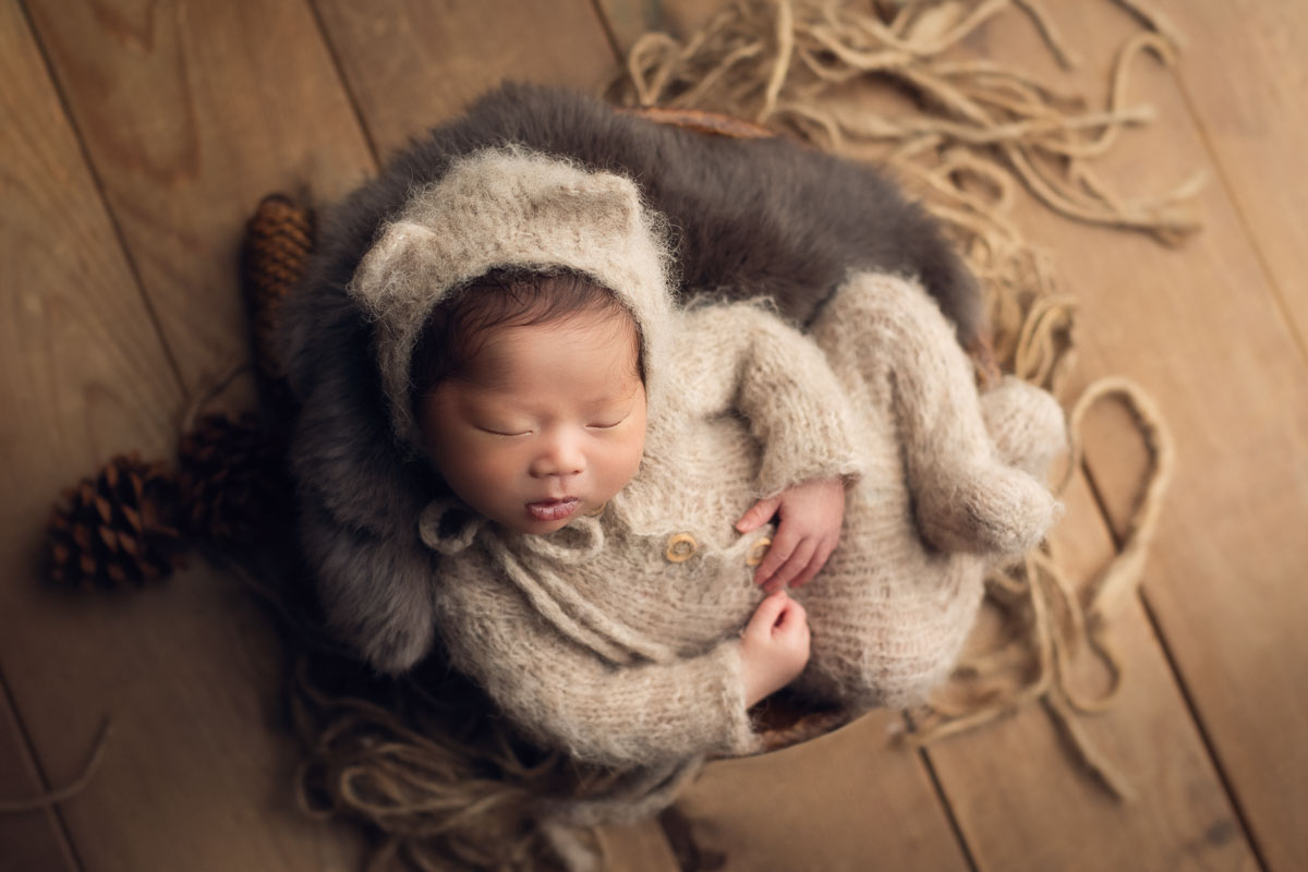 newborn in brown setup - jana photography