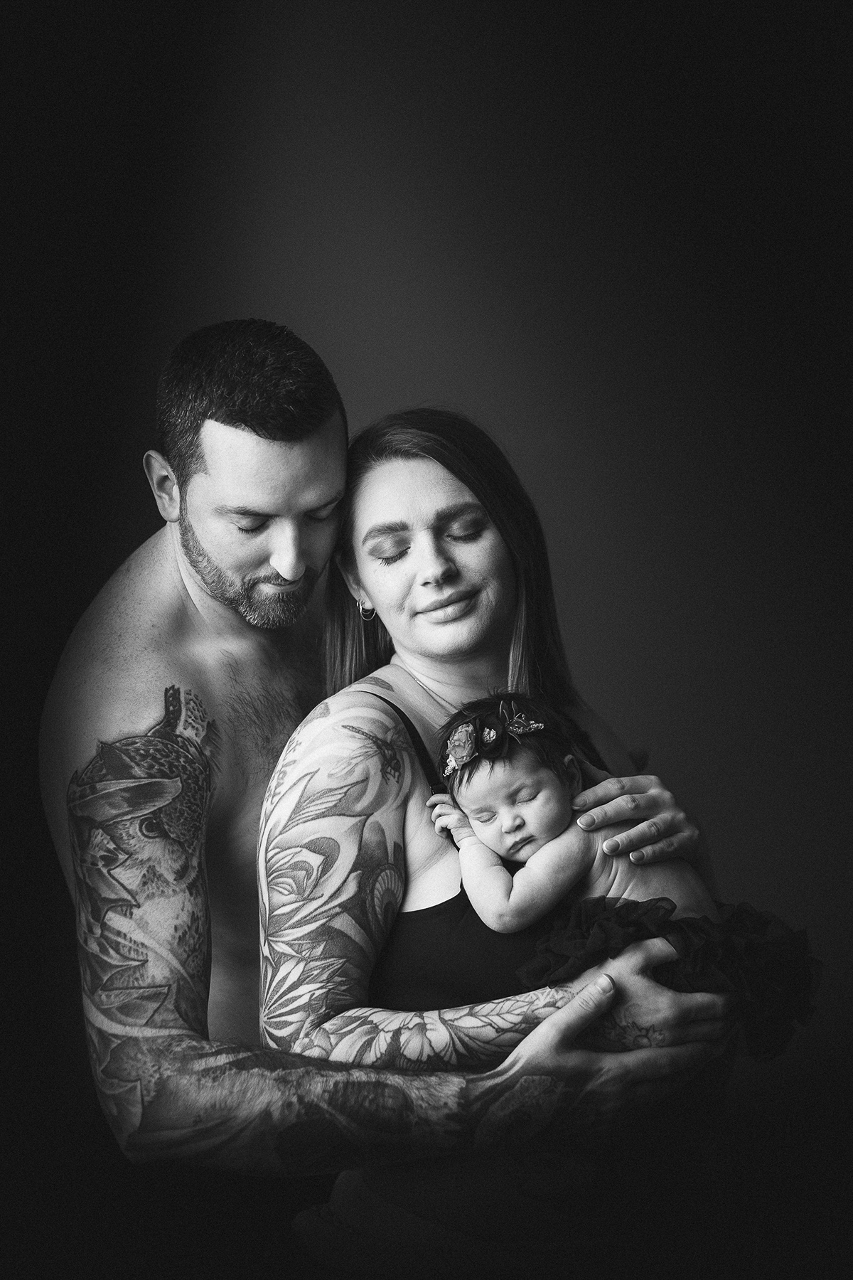 Family of three with newborn baby, black and white newborn photography Vancouver
